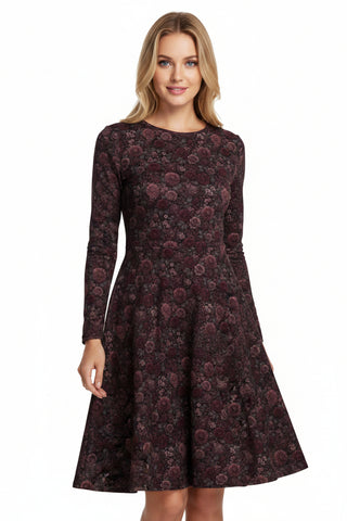 Black dress with red and yellow pattern on a white background